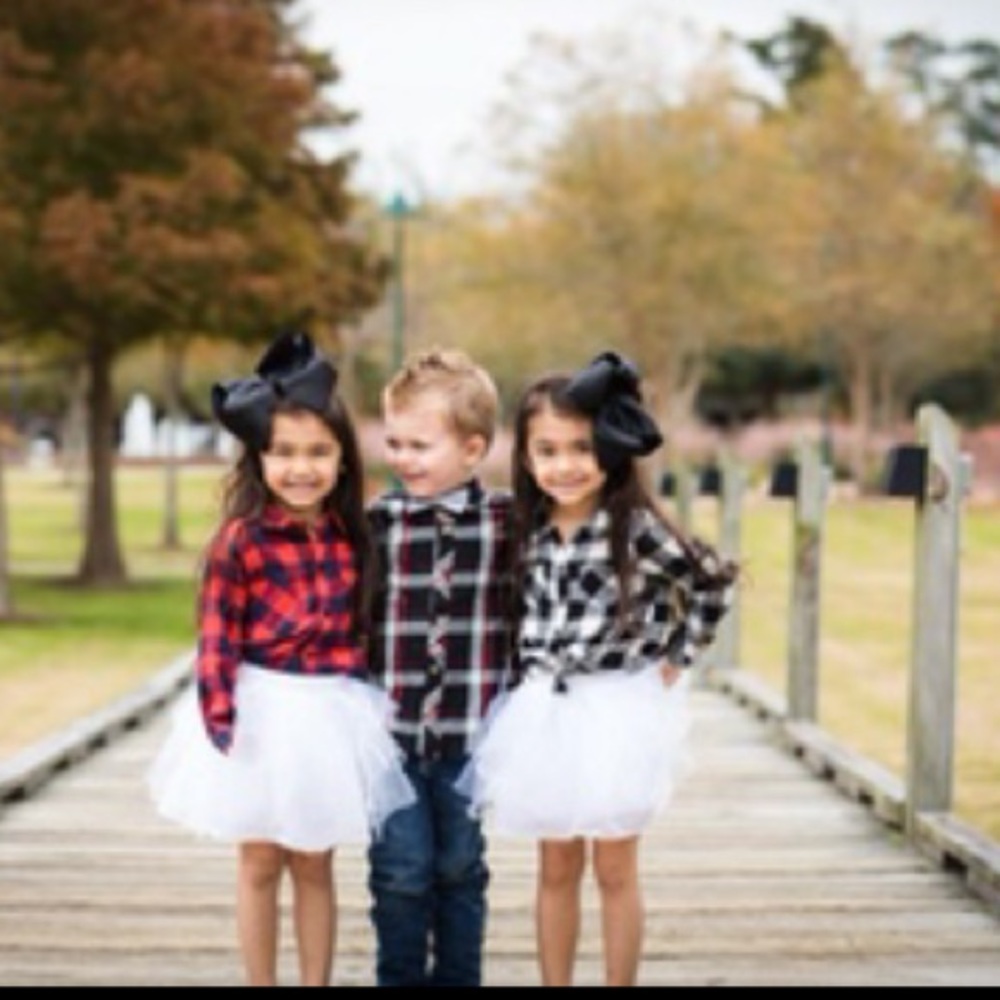 Red and black plaid with white tulle skirt.